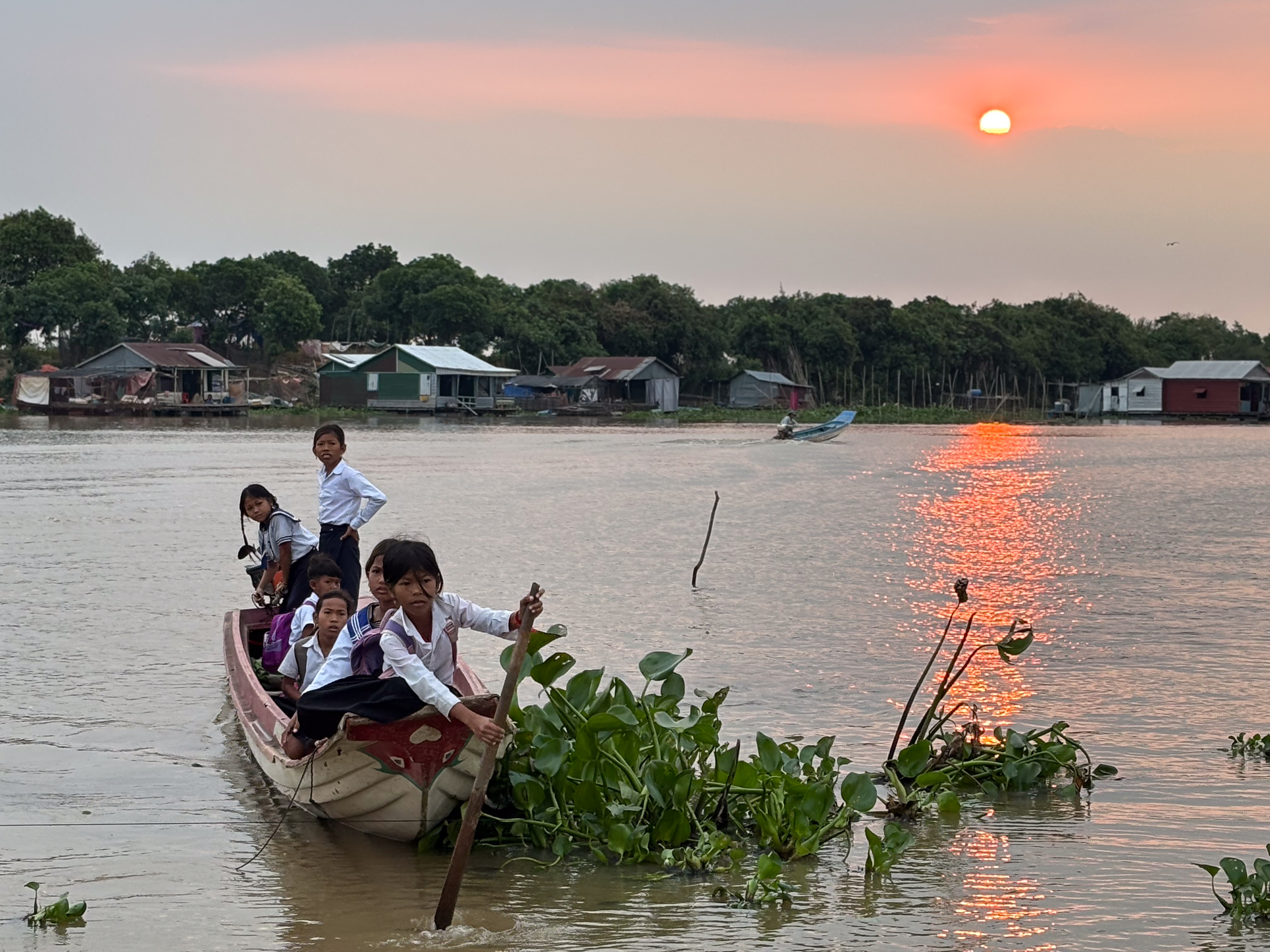 Students Riding Boat to School