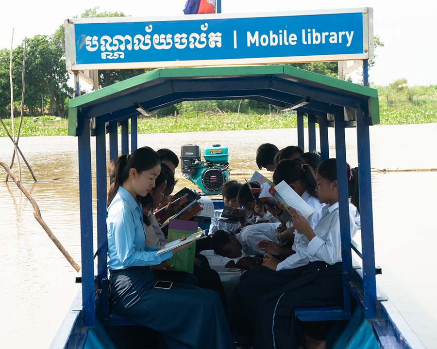 Children on Boat With Books