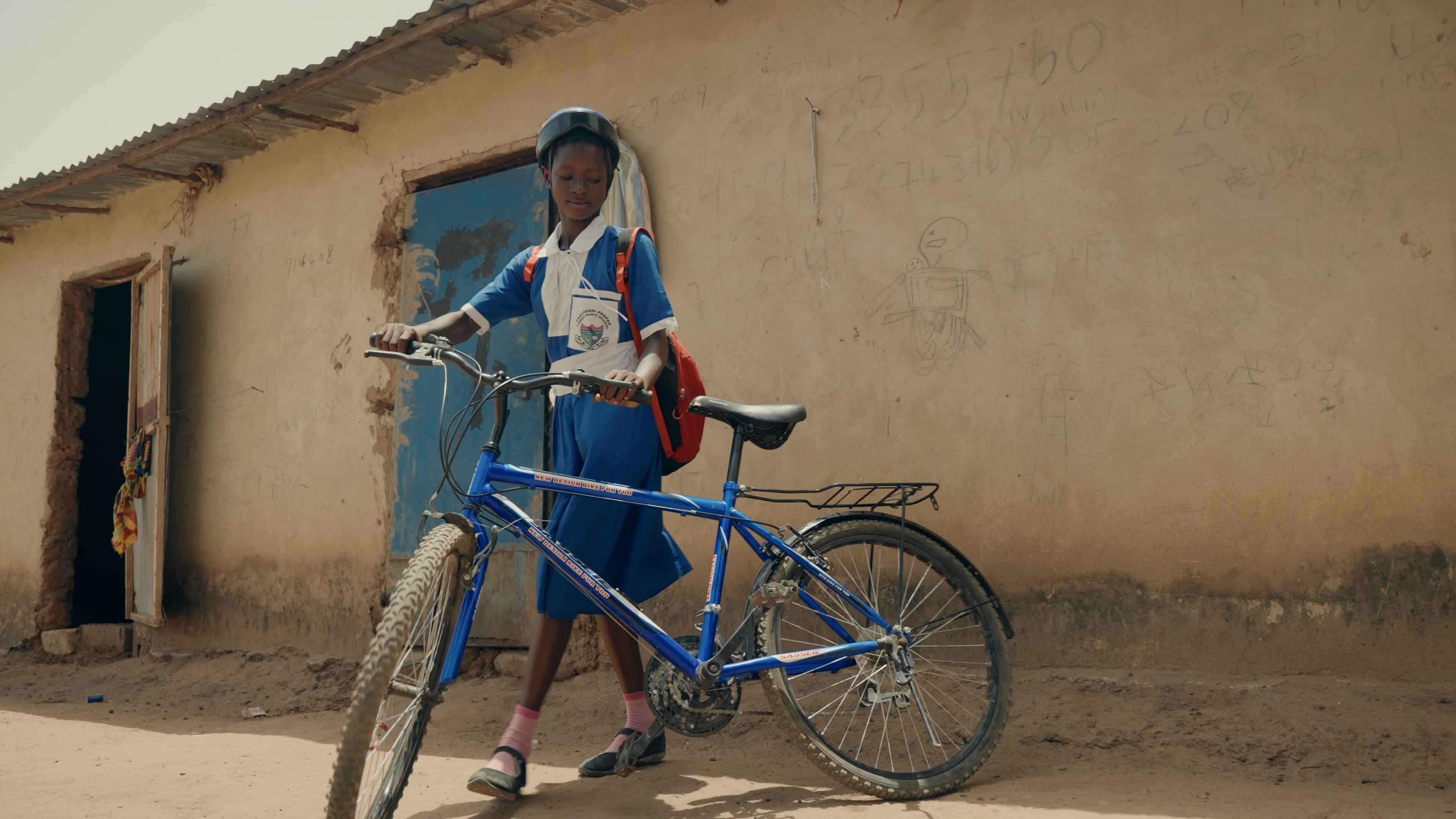 Student With Her Bicycle