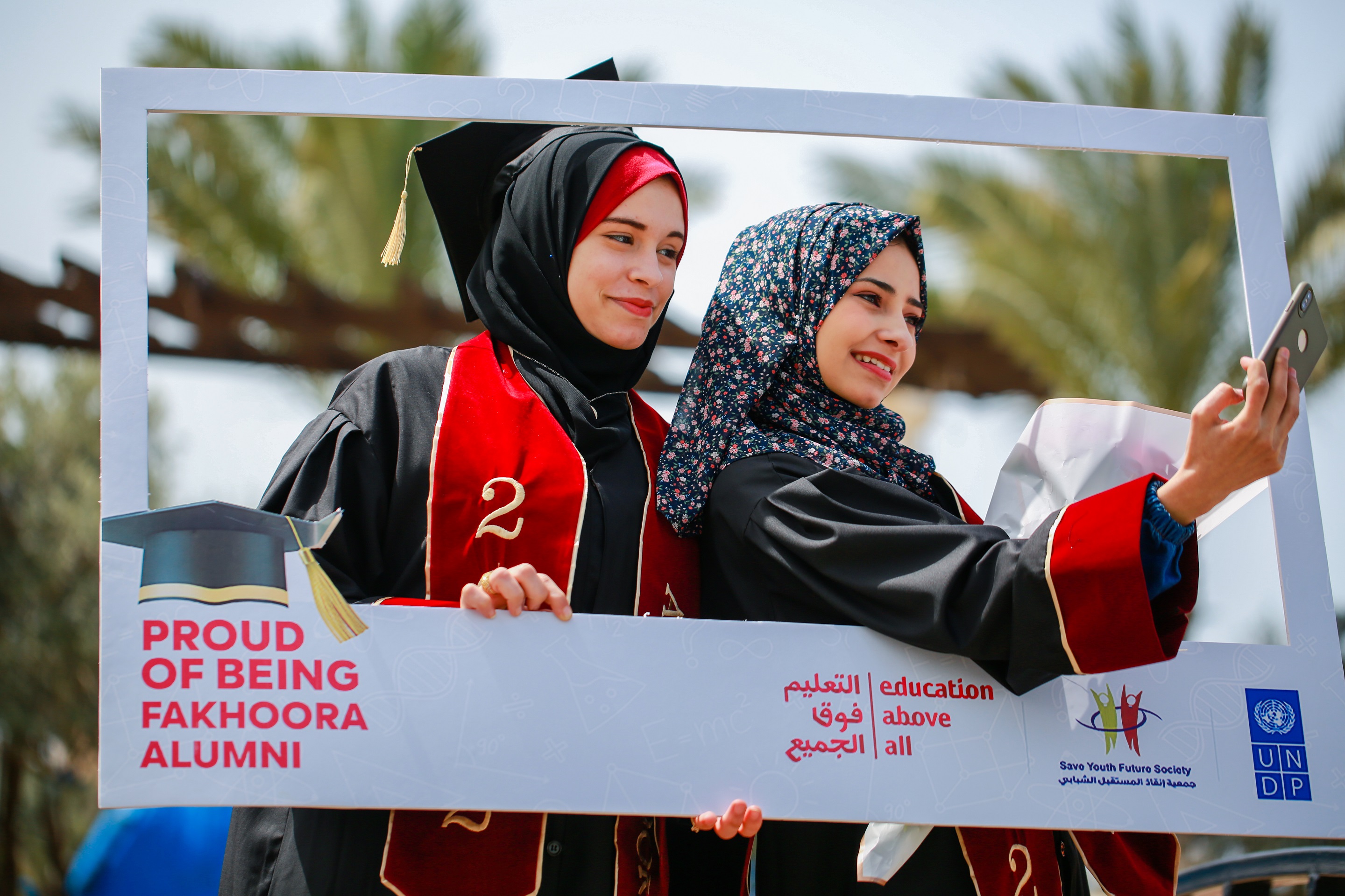 Student poses at their scholarship awarding ceremony