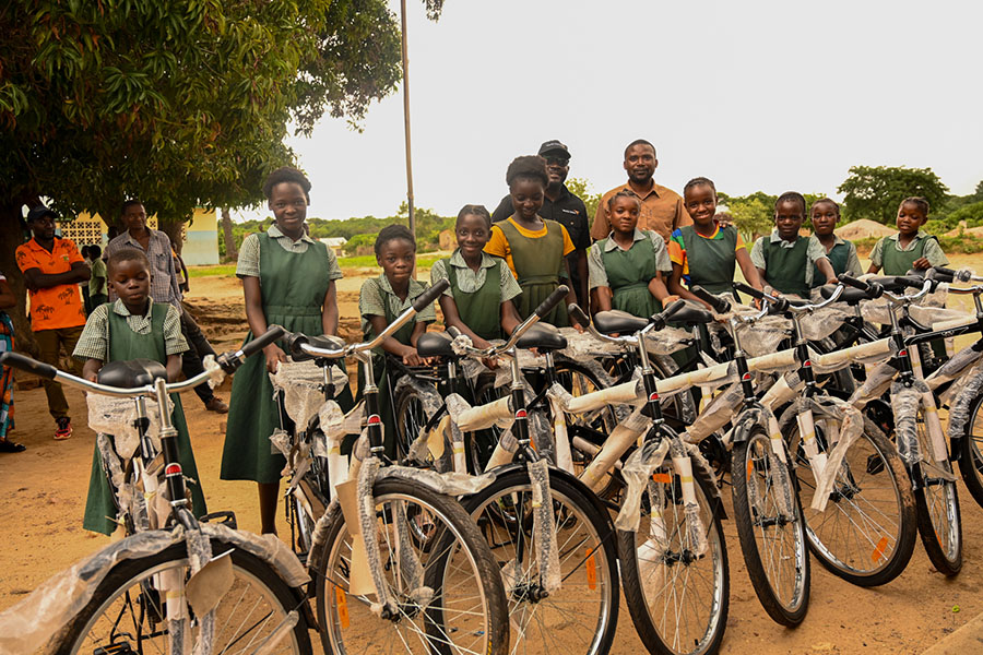 Beauty and her classmates with their bicycles.